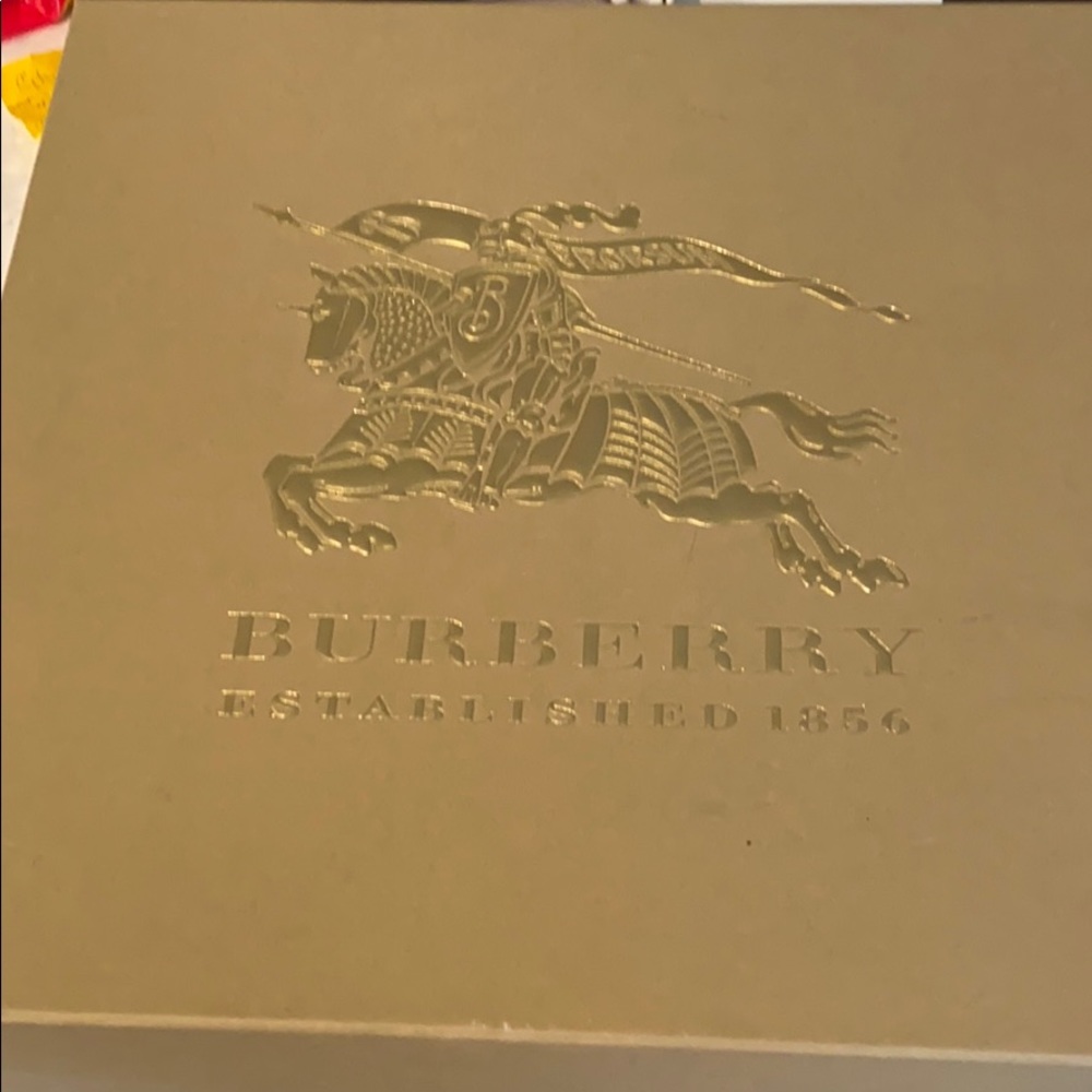 Burberry ankle rain boots.